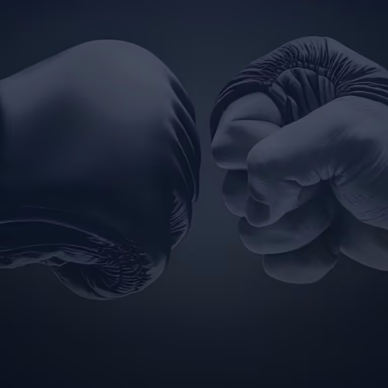 Two boxing gloves about to clash – Billionaire Spin Casino knockout bonus game.